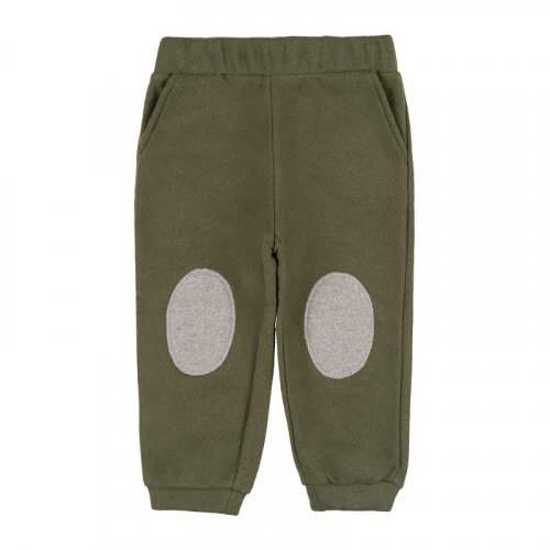 Green trousers with patches