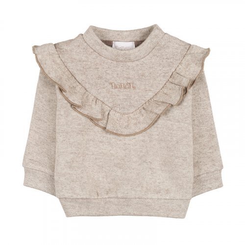 Blusa con volantes beige